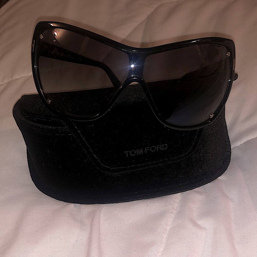Dark tinted Tom Ford wrap cat eye sunglasses
